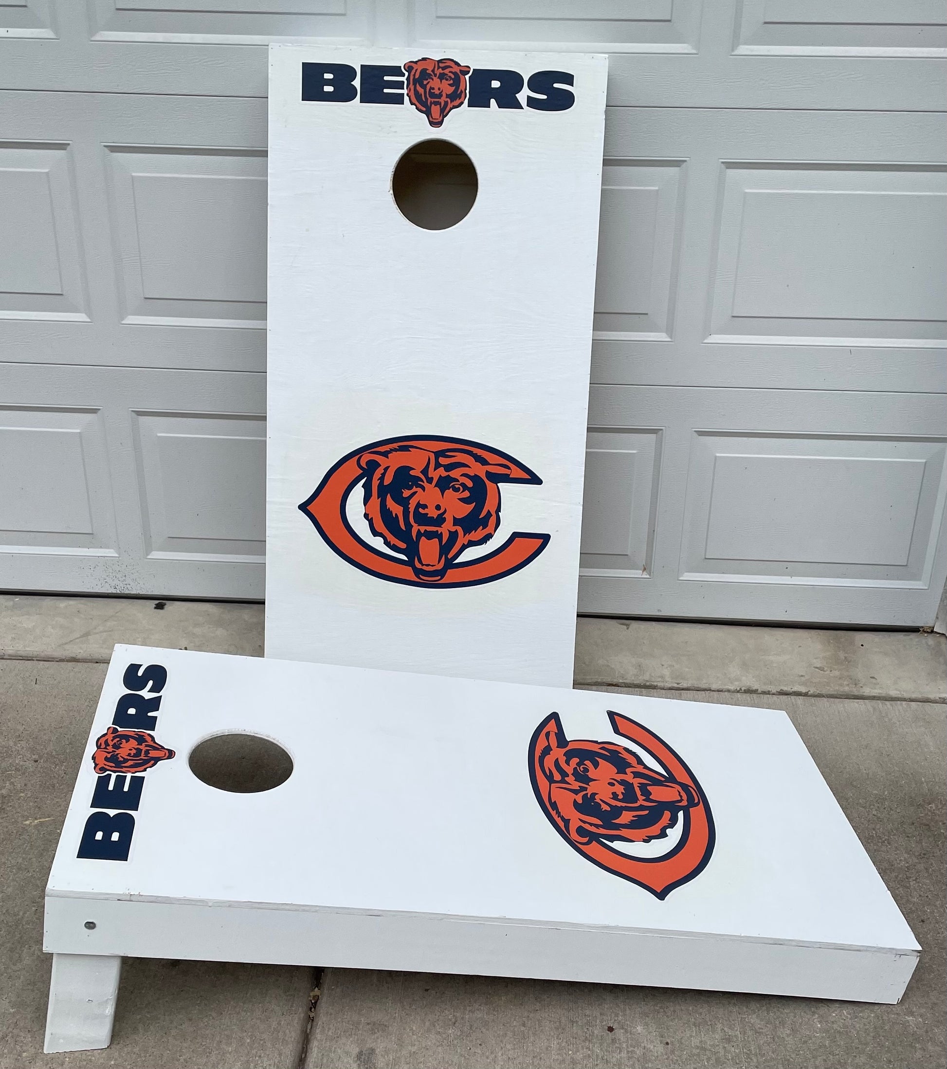 -You get 2 boards (2ft X 4ft) with folding legs. Boards are made from 1/2" Plywood & legs are made from premium 2x4.  -Hole is cut out & sanded for a smooth opening.  -Set is coated with an exterior grade Polyurethane for lasting protection.  -This set is official size set.